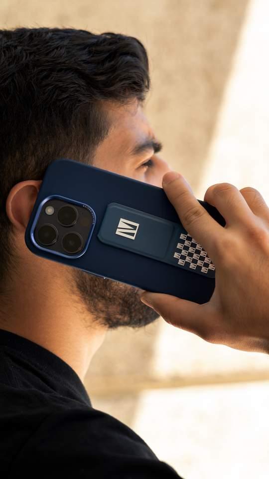 Morphix Silicone Case alt="A man talking to his phone and Morphix Silicone Case Cover on his iPhone14 "